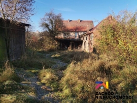 Działka zabudowana o pow. 6200 m2 w Dąbrowie